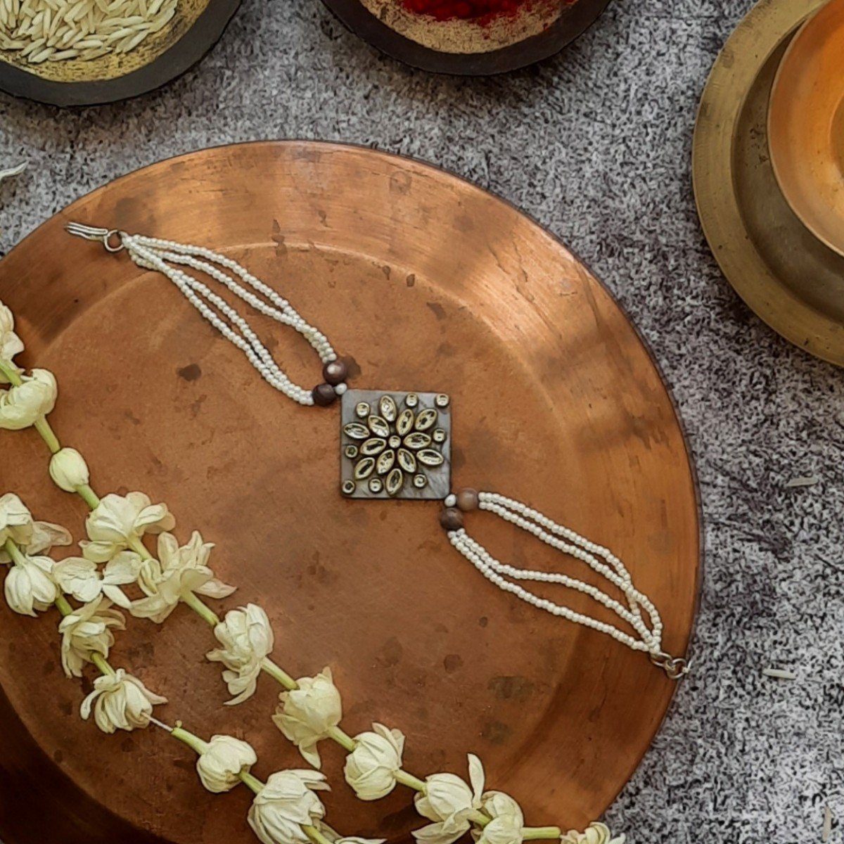 Kundan Rakhi On Mother Of Pearl | Verified Sustainable by Brown Living™