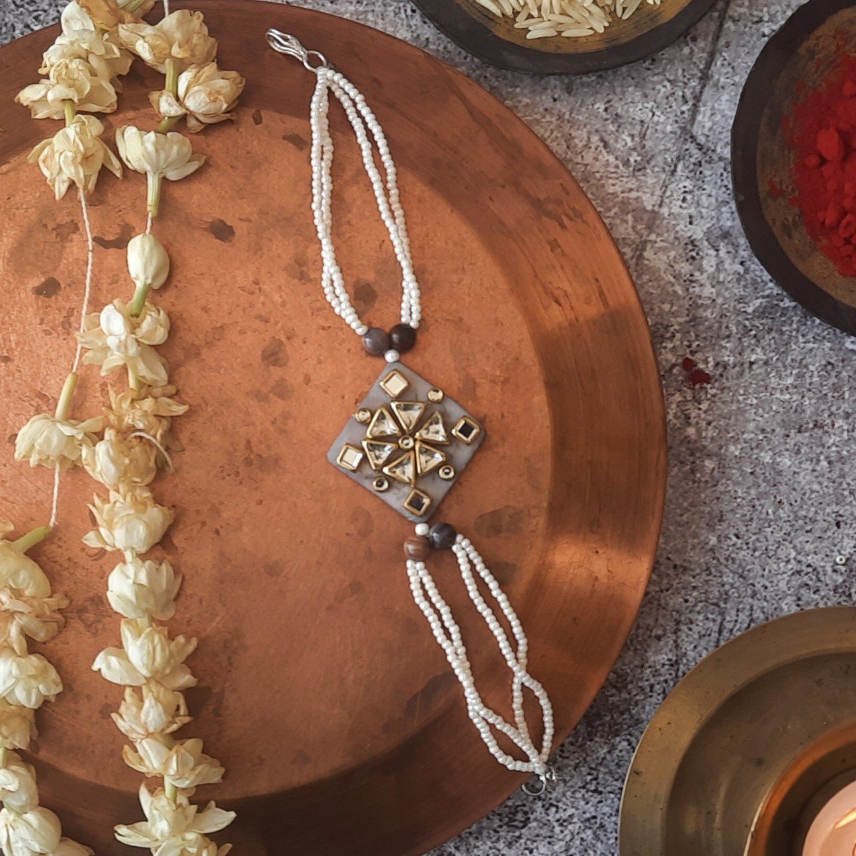 Kundan Rakhi On Mother Of Pearl | Verified Sustainable by Brown Living™