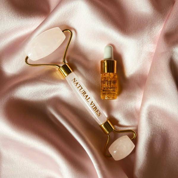 White Crystal Quartz Roller & Massager with FREE Gold Beauty Elixir Oil | Verified Sustainable by Brown Living™