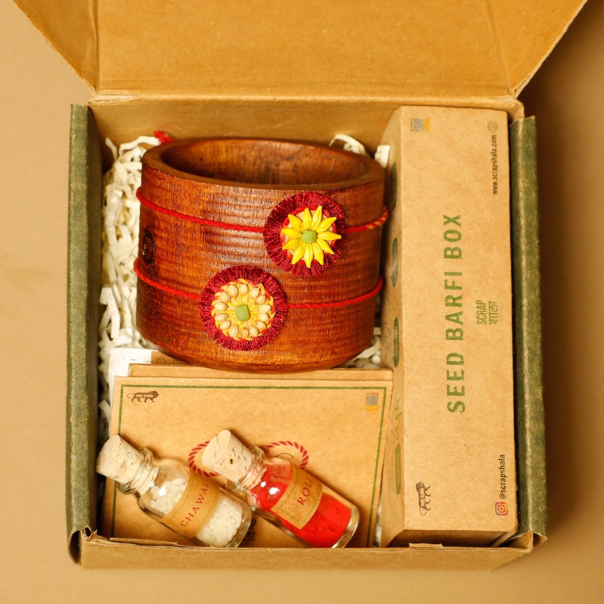 Akkad - Bakkad Premium Rakhi Box | Set of 2 Plantable Rakhi & Planting Material – Rakhi by Scrapshala available on Brown Living™. . SKU: SSR014. Img 1.