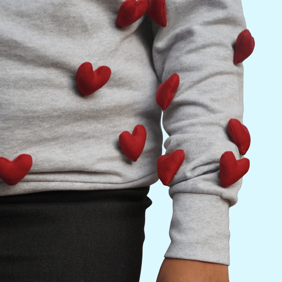 All Hearts Grey Sweatshirt | Cozy Unisex Cotton Fleece Sweatshirt – Womens Sweatshirt on Brown Living™. SKU: 4ALLHEARTSGREYMELANGES. Img 1.