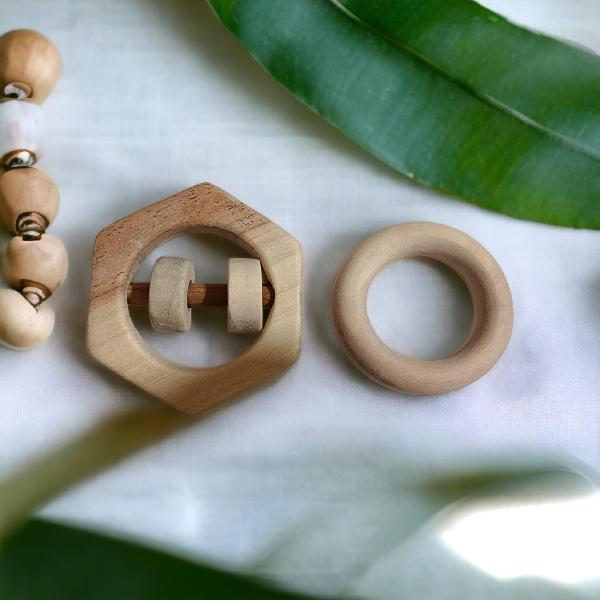 Baby Chilling Neem Wooden Rattle & Teether Set Of 2 Toys – Wooden Toys on Brown Living™. SKU: RT_HXN-RNG. Img 6.