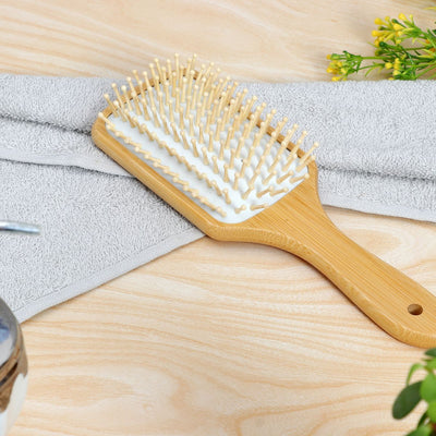 Bamboo Paddle Hairbrush | Soft Bamboo Pins & Anti - Static Design – Hair Brush on Brown Living™. SKU: KOE-013. Img 2.