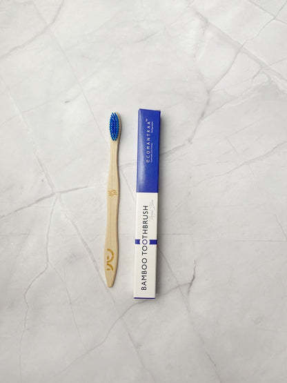 Bamboo Toothbrush with Blue Bristles – Eco - Friendly & Biodegradable – Toothbrush on Brown Living™. SKU: EM0001B. Img 1.