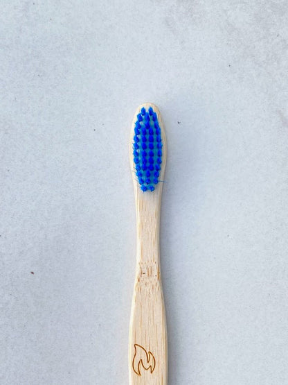 Bamboo Toothbrush with Blue Bristles – Eco - Friendly & Biodegradable – Toothbrush on Brown Living™. SKU: EM0001B. Img 3.