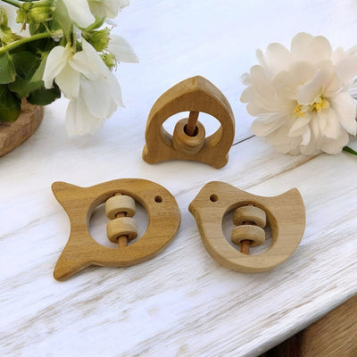 Beautiful Rattle Toys – Dove, Fish & Rocket Shapes For Babies – Baby Rattles on Brown Living™. SKU: R_DV-FSH-RKT. Img 3.