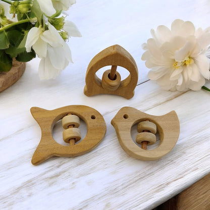 Beautiful Rattle Toys – Dove, Fish & Rocket Shapes For Babies – Baby Rattles on Brown Living™. SKU: R_DV-FSH-RKT. Img 3.