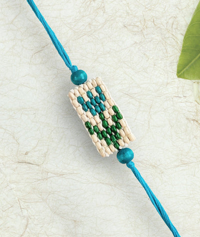 Blue Pixel Tulip Rakhi – Rakhi on Brown Living™. SKU: Gul-14. Img 1.