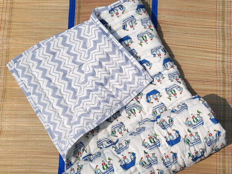 Blue & White Ship Print Kids Handcrafted Quilt | Verified Sustainable Bed Linens on Brown Living™