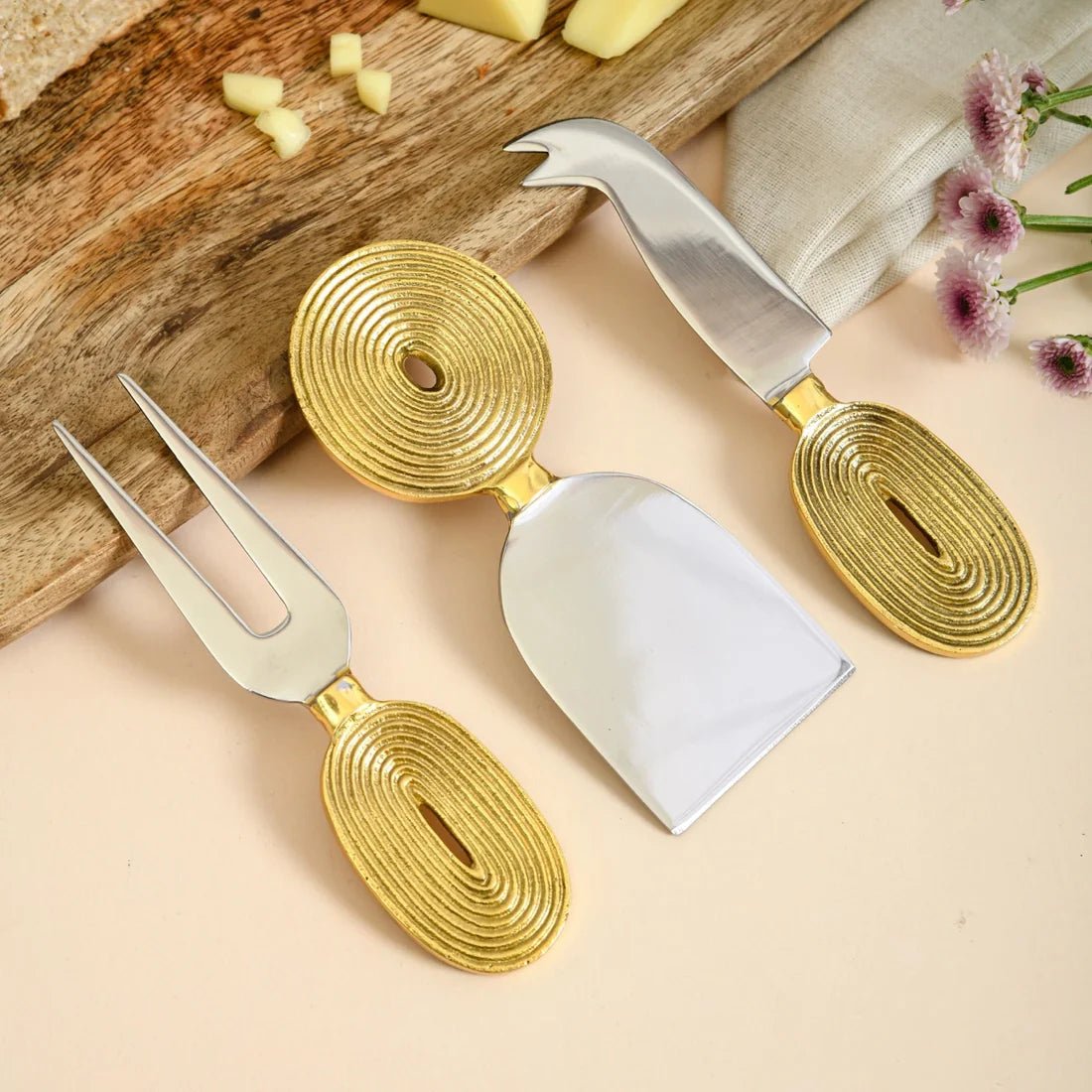 Brass Cheese Knife Set of 3 | Ekaantrik - Concentric design – Kitchen Tools by Pravaah India available on Brown Living™. . SKU: PRA23HD014BL. Img 1.