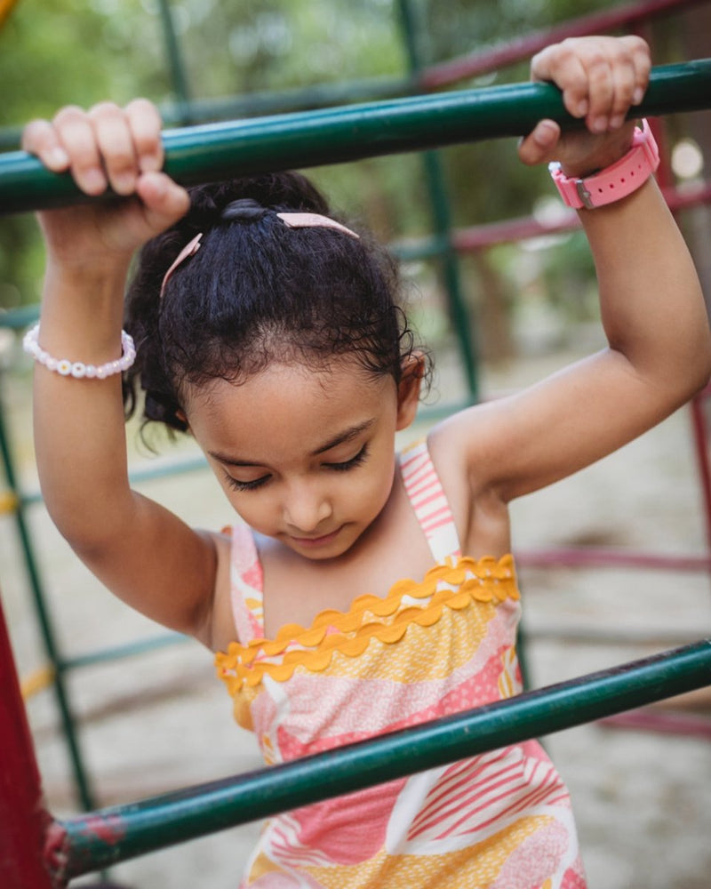 Candy Escape Printed Sleeveless Cotton Midi Dress with Tie - Up | Verified Sustainable Kids Frocks & Dresses on Brown Living™