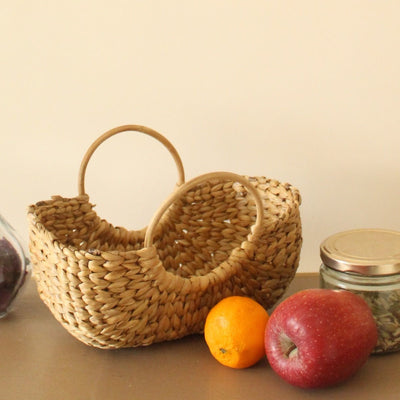 Cane Handle Water Hyacinth Basket – Baskets & Boxes on Brown Living™. SKU: SC0114. Img 1.