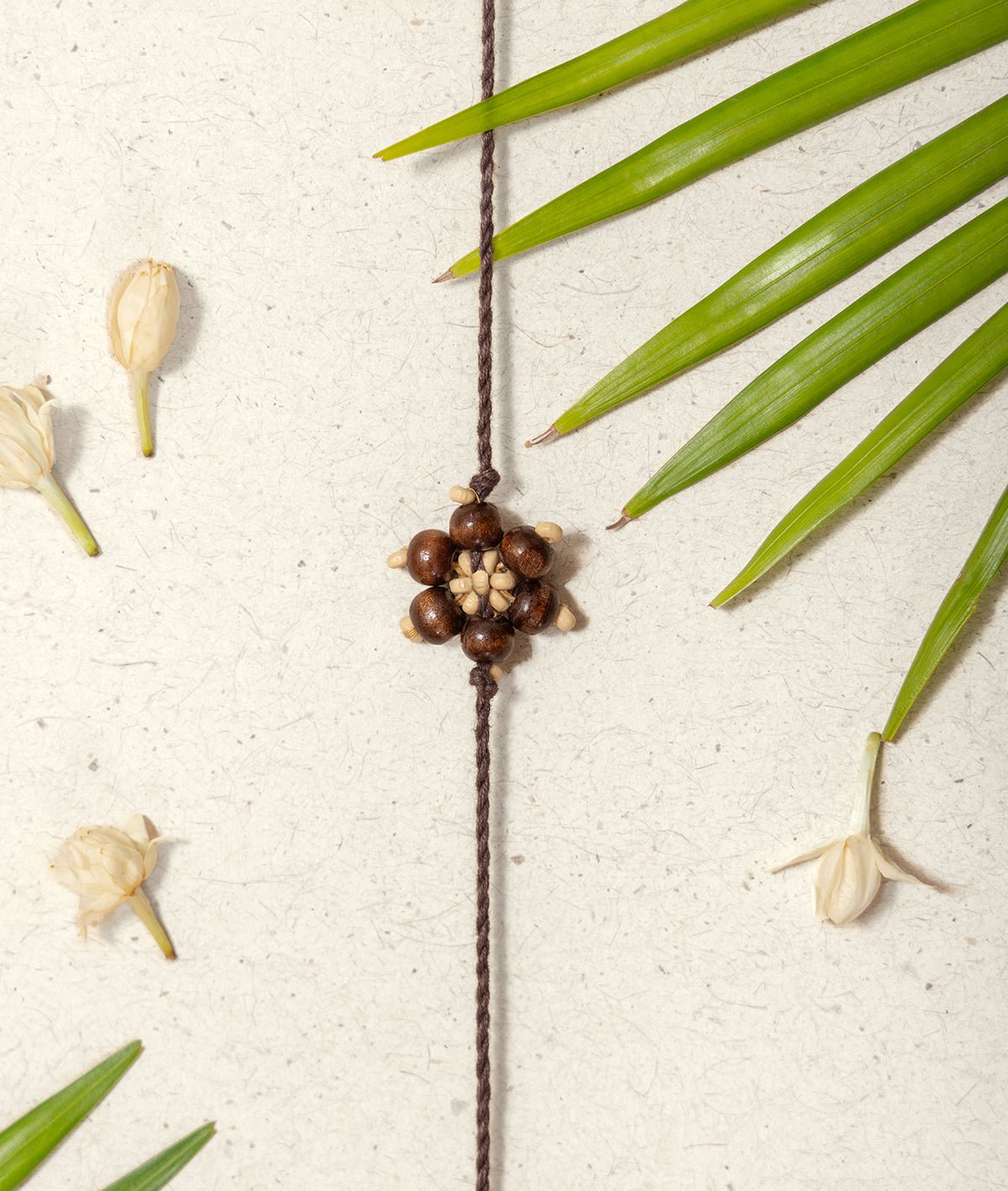 Chandan Phool Rakhi – Rakhi on Brown Living™. SKU: Gul-21. Img 1.