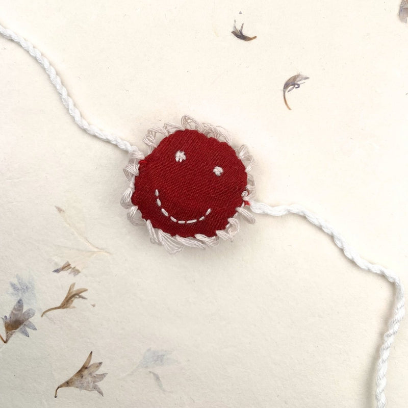 Cheery - Reusable Maroon Smiley Shaped Eco - friendly Kids Rakhi | Verified Sustainable by Brown Living™