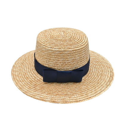 Classic Boater Hat with Navy Blue Ribbon | Timeless Summer Style – Womens Hat on Brown Living™. SKU: MBNL002045. Img 2.