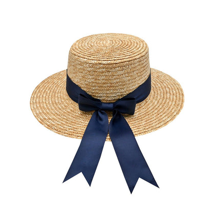 Classic Boater Hat with Navy Blue Ribbon | Timeless Summer Style – Womens Hat on Brown Living™. SKU: MBNL002046. Img 3.