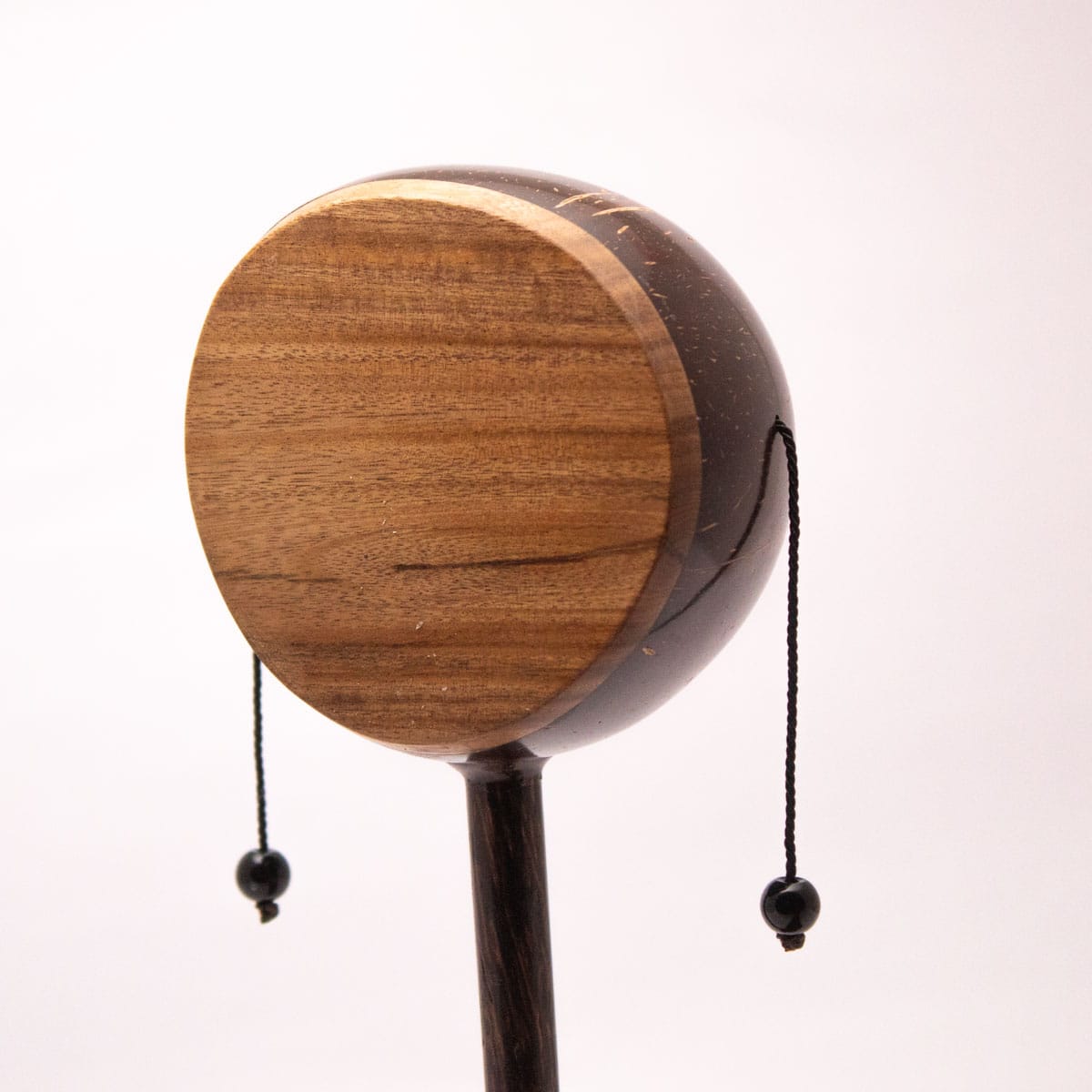 Coconut Shell Kudhukudhuppu – Traditional Musical Toy for Kids – Musical Instruments on Brown Living™. SKU: EGM05. Img 2.