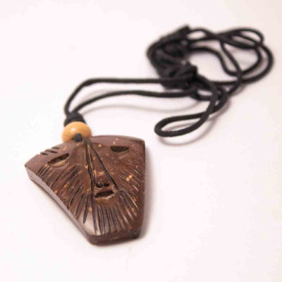 Coconut Shell Pendant - Trible Face Design – Womens Charms & Pendants on Brown Living™. SKU: 306 - 17865 - EGP03. Img 1.