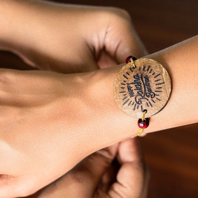 Coconut Shell Rakhi Sets - Rough (Package includes 3 Rakhis, Kumkum, Rice Grains & Raksha Bandhan Card) - Set of 3 – Rakhi on Brown Living™. SKU: TGARGHRKHI. Img 3.