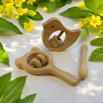 Combo of Rattles & Teether - Dove, Mickey Head & Dumbbell Shapes – Wooden Toys on Brown Living™. SKU: RT_DV-MKHD-DBL. Img 1.