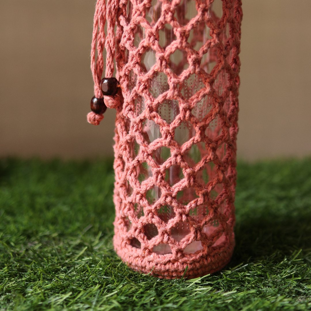 Crochet Web Peach Handmade Bottle Cover | Verified Sustainable by Brown Living™