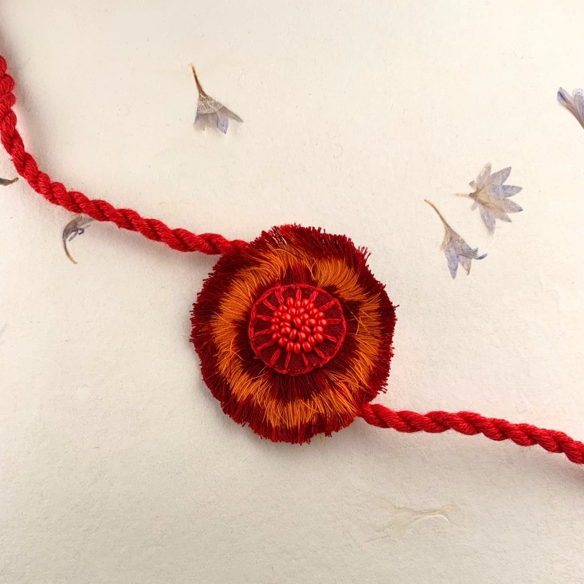 Dual Avtar Ikat Rakhi - Red Orange | Reusable Ikat Rakhi | Verified Sustainable by Brown Living™