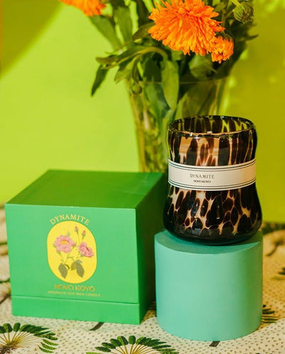 Dynamite Candle | Peachy Punch & Woody Amberwood Scented Soy Candle – Candles & Fragrances on Brown Living™. SKU: DTGC002. Img 2.