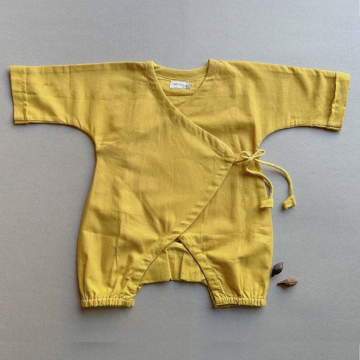 Earth Yellow Baby Romper – Kids Onesies on Brown Living™. SKU: AGHYKHROMNB. Img 1.
