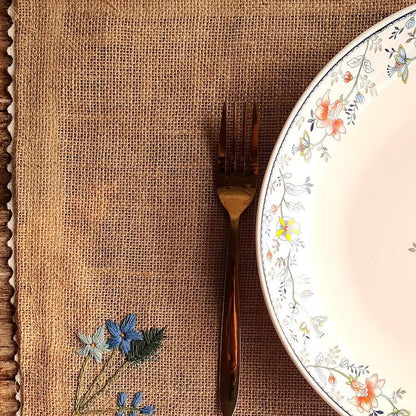 Embroidered Jute Table Mat Forget Me Not (Set of 4) – Home Decor by Studio Vilasita available on Brown Living™. . SKU: MP_JMFMEN4. Img 3.