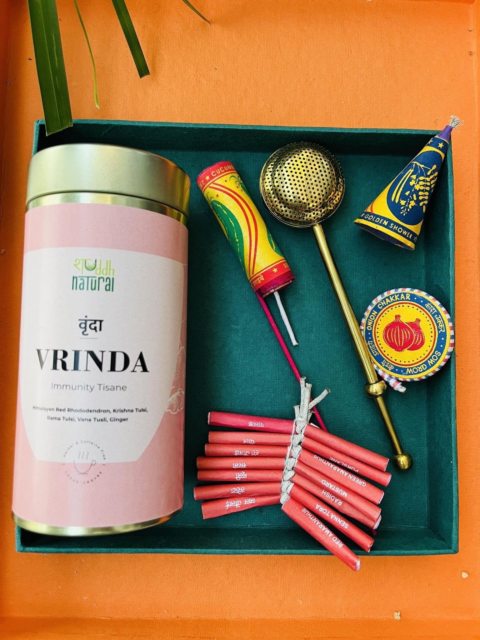 Festive Hamper | Tea I Seed Patakha Set of 4 | Brass Strainer – Gift Hampers on Brown Living™. SKU: SNTBSP04. Img 6.