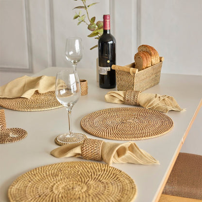 Flora Rattan Placemat – Grey, Stylish Dining & Table Accessory – Table Linens on Brown Living™. SKU: FloraPlacematGrey. Img 1.