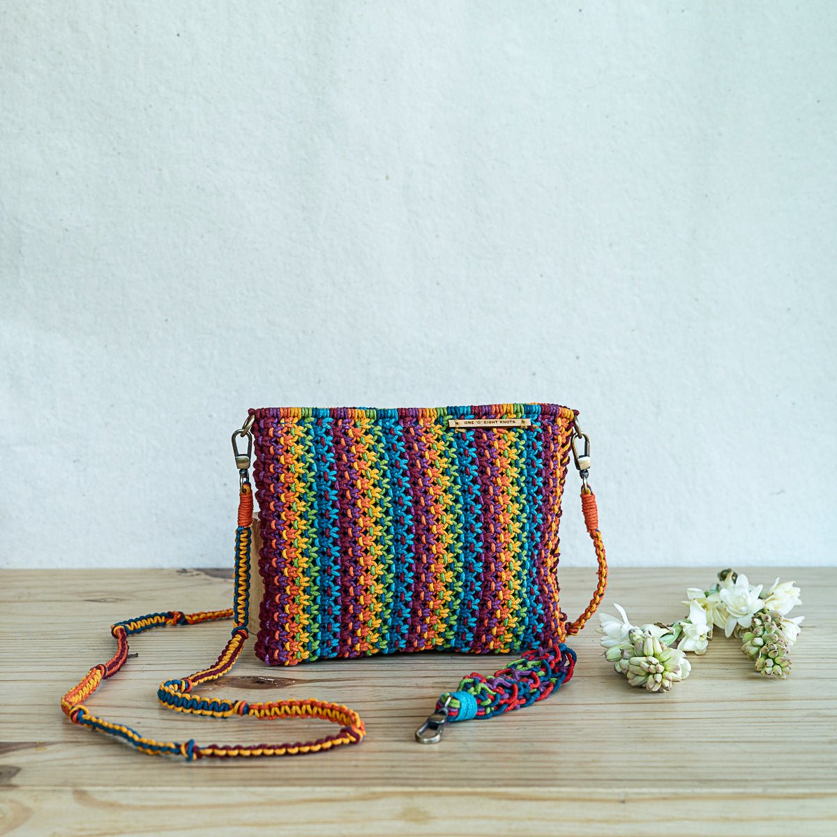 Gardenia Hand - Knotted Sling Bag | Blended Yarn Artisan Sling – Sling Bag on Brown Living™. SKU: S23MGARSLIN171-BL. Img 1.