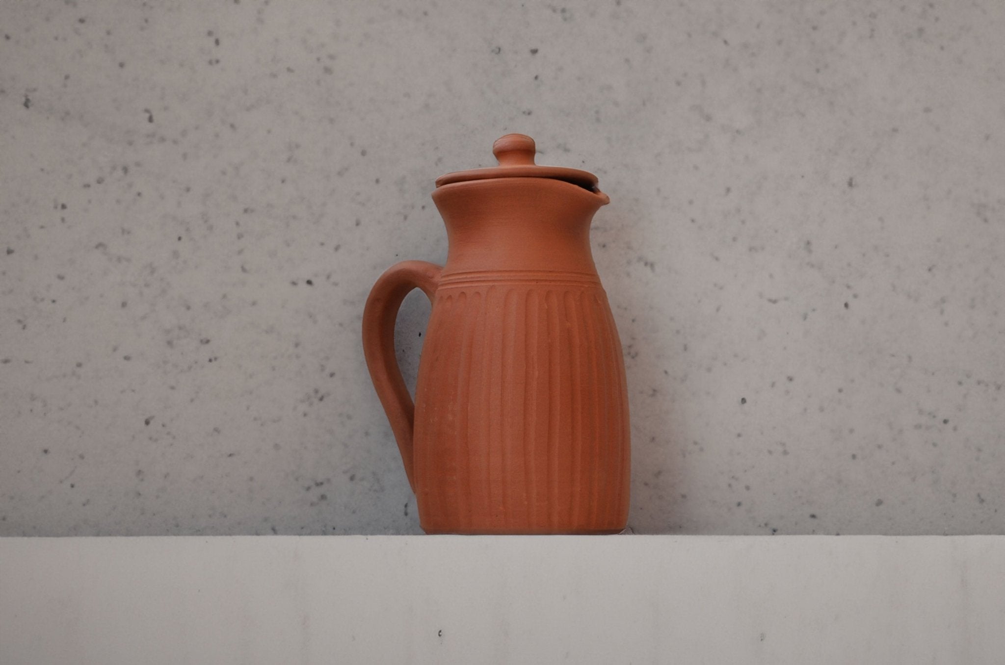 Handamde Terracotta Jug with Carving On All Sides | Verified Sustainable by Brown Living™