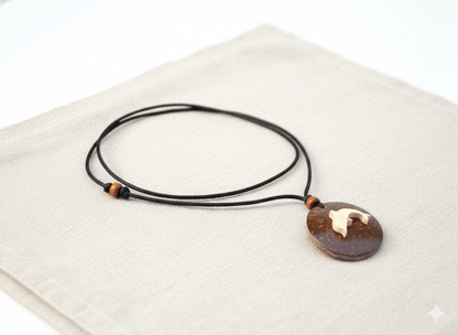 Handcrafted Coconut Shell Dolphin Pendant with Cotton Rope – Womens Charms & Pendants on Brown Living™. SKU: KOTT025. Img 2.