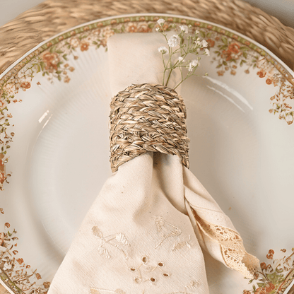 Handmade Sabai Napkin Rings (Set of 4) – Table Decor by Kadam Haat available on Brown Living™. Natural . SKU: SASDNHNAT - NEW. Img 3.