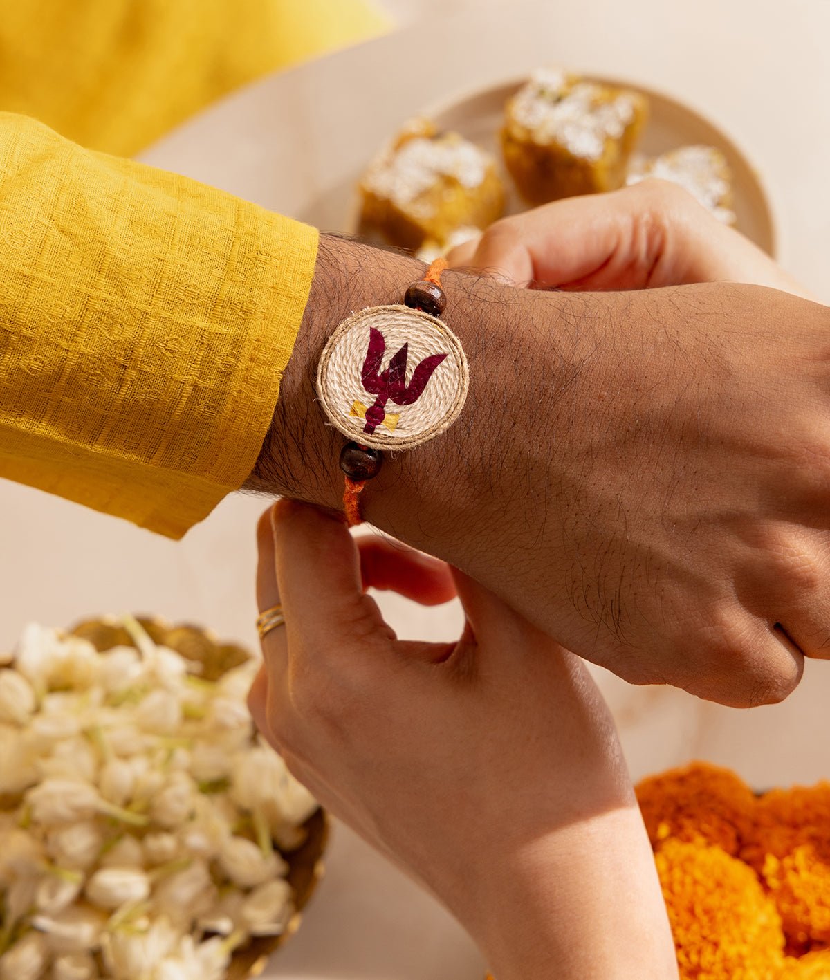 Handmade Traditional Raksha Bandhan Trishul Rakhi – Rakhi on Brown Living™. SKU: GUL-08. Img 2.