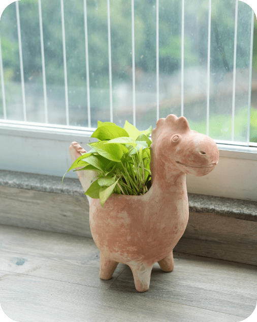 Jurassic Dinosaur Earthen Planter – Pots & Planters by Swadeh available on Brown Living™. . SKU: A0_plt_0025. Img 1.