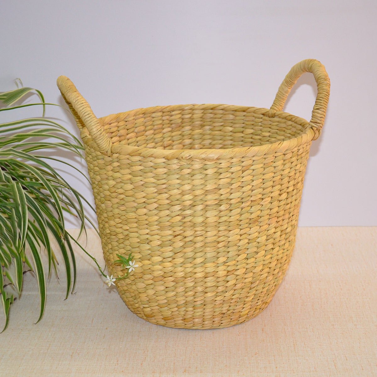 Kauna Curved Storage Basket – Baskets & Boxes by DHARINI available on Brown Living™. . SKU: KAUBAS034A. Img 1.