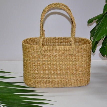 Kauna Oval Gift & Utility Basket Bag - Natural – Baskets & Boxes on Brown Living™. SKU: KAOBAG019A. Img 1.