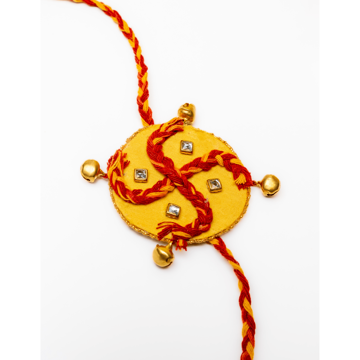Kesar Swastik Rakhi | Handmade Auspicious Swastik Rakhi – Rakhi on Brown Living™. SKU: AM-RAK-Kesar. Img 3.