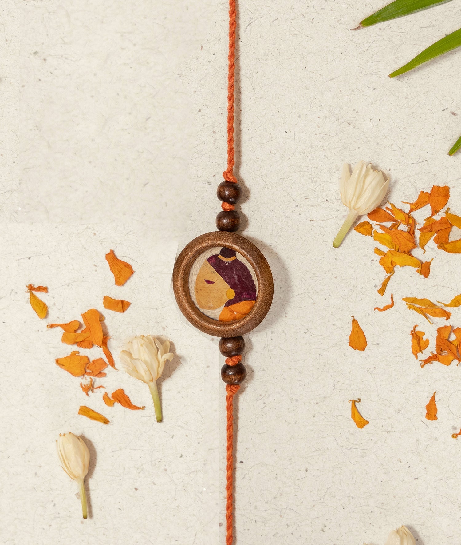 Kesariya Rakhi & Lumba Set | Handmade Bhaiya Bhabhi Rakhi Gift Set – Rakhi on Brown Living™. SKU: GUL-09. Img 1.
