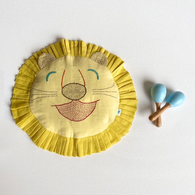 Kids Newborn Gift Set - Organic Cotton Mustard Seed Lion Pillow and Maracas – Gift Giving on Brown Living™. SKU: LON - MAR - BLU. Img 1.