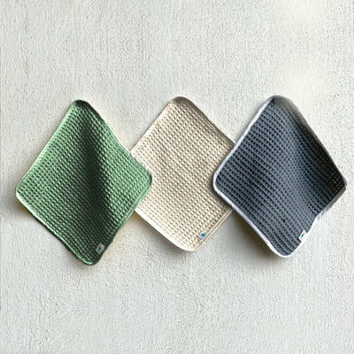 Kids Organic Cotton Handwoven Waffle Washcloths – Kids Travel Accessories on Brown Living™. SKU: WSH SET 3 - GRY - MNT - CRM. Img 1.