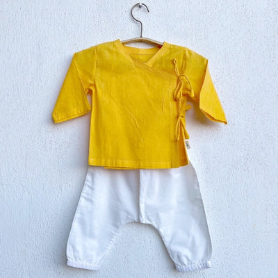 Kids Unisex Organic Cotton Yellow Angrakha and White Pants – Kids Ethnic Sets on Brown Living™. SKU: WWE - YLOWHT - ANGPJ - 03 - 0322. Img 1.