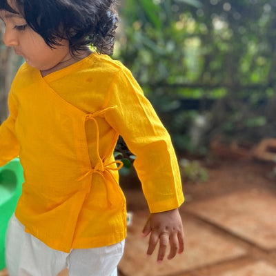 Kids Unisex Organic Cotton Yellow Angrakha and White Pants – Kids Ethnic Sets on Brown Living™. SKU: WWE - YLOWHT - ANGPJ - 03 - 0322. Img 3.