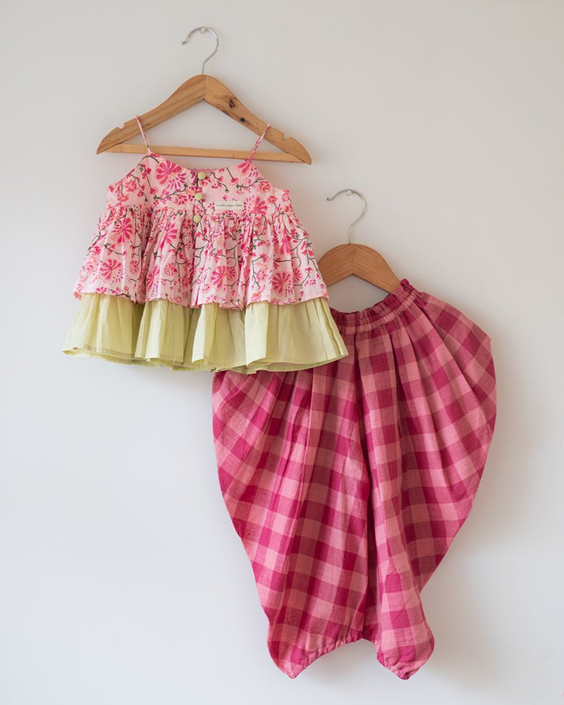 Leela Cotton Pink Floral Flared Top With Checkered Pants Coord Set – Kids Ethnic Sets by Love The World Today available on Brown Living™. 6 - 12 M . SKU: C34G5RBC612. Img 1.