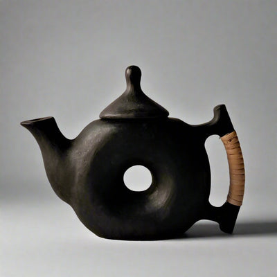 Longpi Black Pottery Chakra Teapot – Beverage Accessories on Brown Living™. SKU: SACHII011. Img 1.