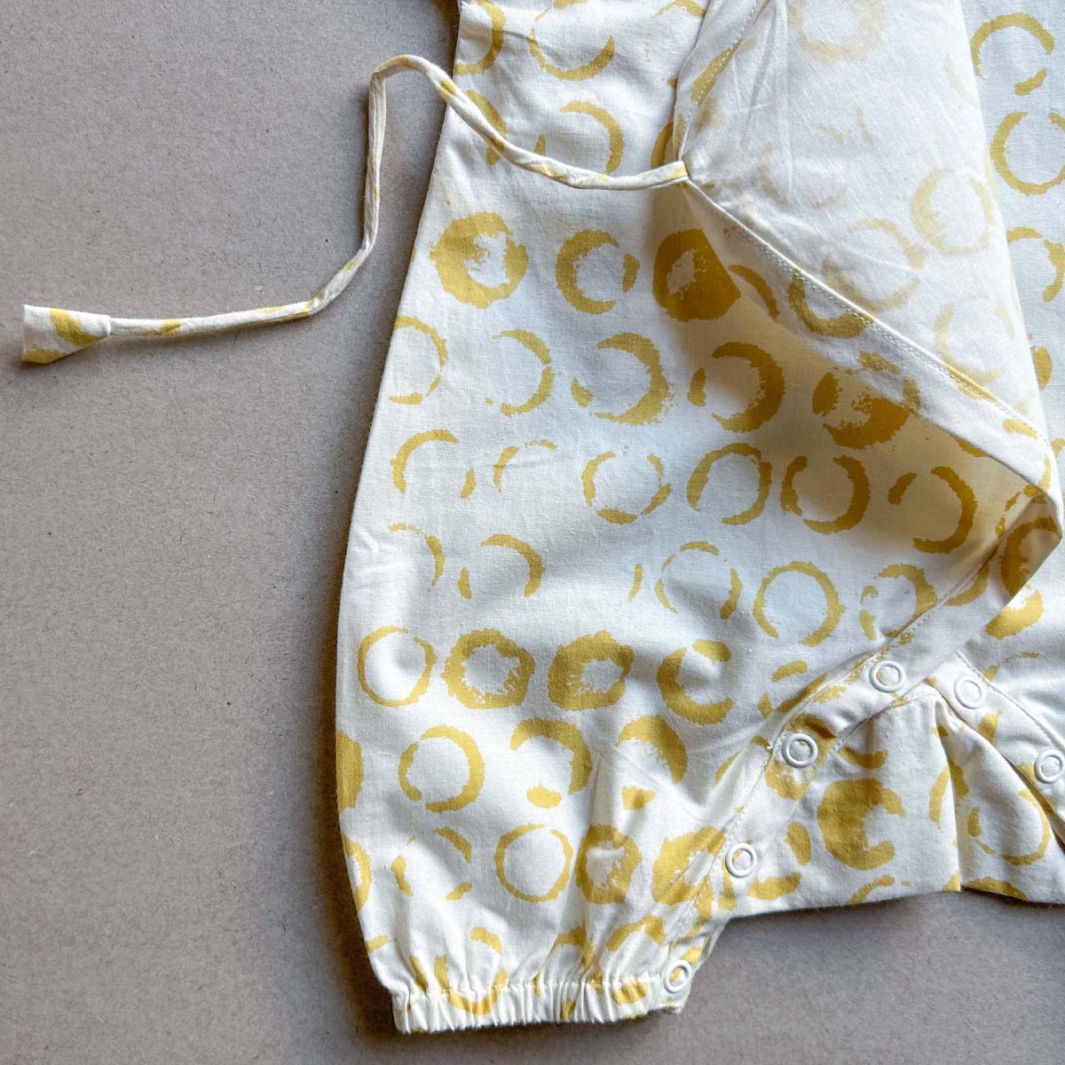 Luna Baby Romper – Kids Onesies on Brown Living™. SKU: AGHLUNAROMPOPNB. Img 3.