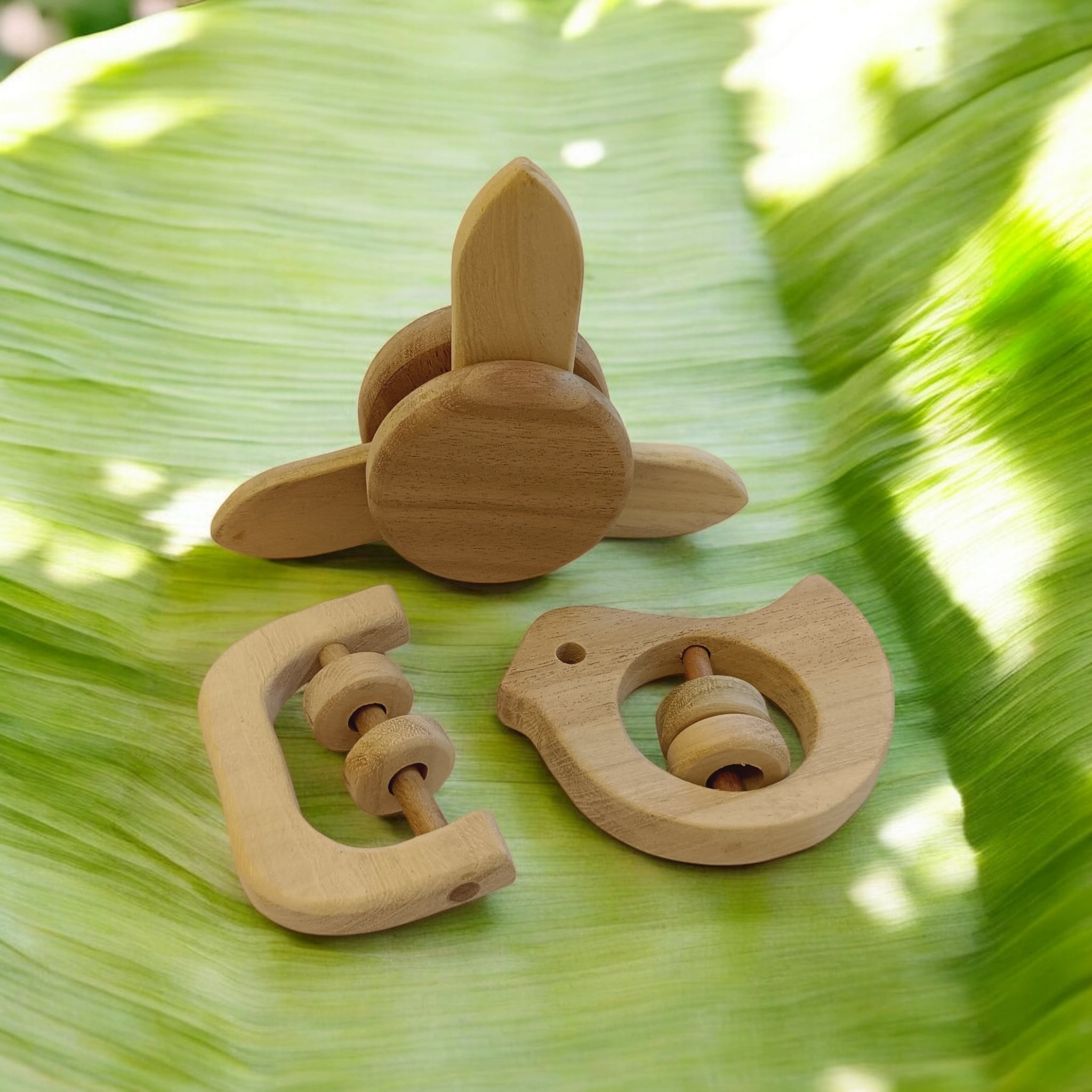Neem Wooden Flower Tumbler, Dove & C - Shape Rattles For Toddlers – Baby Rattles on Brown Living™. SKU: R_FLTMBLR-DV-C. Img 1.