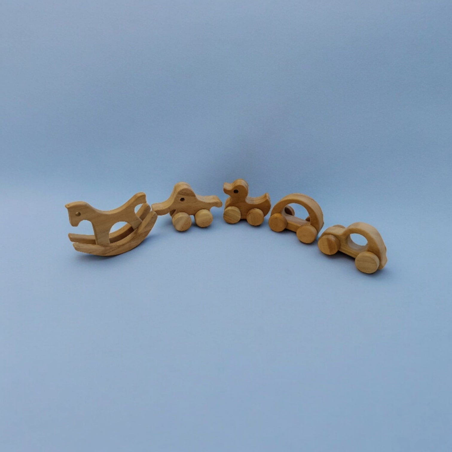 Neem Wooden Swing Horse & Wheel Toys Set of 5 | Baby Play Combo – Wooden Toys on Brown Living™. SKU: SW_SHRS-ELP-HCR-DK-CR. Img 3.